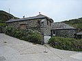 Fish cellars at Church Cove, England, used for pressing salted pilchards into barrels for storage and export to the continent