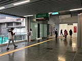 Commuters heading towards the pedestrian link to the One World Hotel