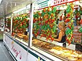 Vendedores de la calle vendiendo sándwiches de cheesesteak y cosas similares.