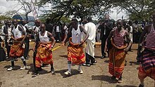 Basoga men showing different dancing techniques of dancing.