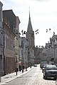 Hängende Schuhe (Shoefiti) in der Norderstraße, im Hintergrund die Marienkirche