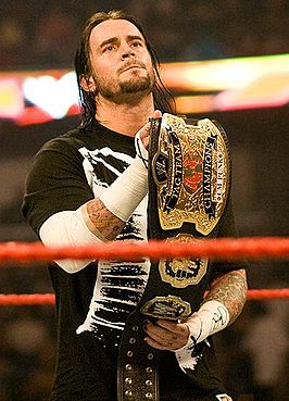 CM Punk met het World Tag Team Championship