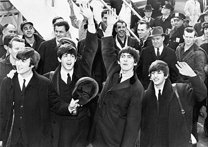 The Beatles arrive at the John F. Kennedy International Airport, New York City (1964).