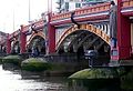 Image 19Vauxhall Bridge across the River Thames opened in 1906 and features sculptures by F. W. Pomeroy.