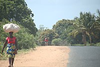 Carrying goods on head in Mozambique