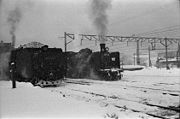 国鉄時代の岩見沢駅構内（1974年）。停車中のC57形蒸気機関車