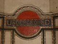 Image 33Early style tube roundel in mosaic at Maida Vale Underground station.