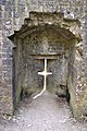 Aspillera en cruz, en el castillo Corfe.