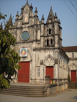 In front of Lác Nội church