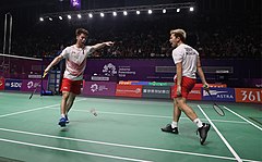 Marcus Fernaldi Gideon and Kevin Sanjaya Sukamuljo celebration at the 2018 Asian Games men's team semi-finals