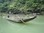 Traditional Miao Boat used to travel down rapids for trading goods.