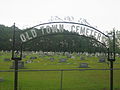 The large Old Town Cemetery in south Haynesville contains the grave of John Sidney Garrett.