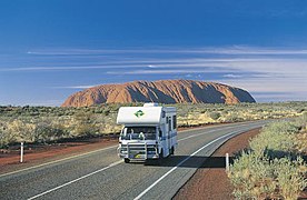 Driving on the Lasseter Highway near the Uluru-Kata Tjuta National Park in the Northern Territory.