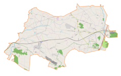 Mapa konturowa gminy Piekoszów, blisko centrum na prawo znajduje się punkt z opisem „Piekoszów”