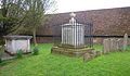 Unusual iron tomb in the churchyard to William Clarkson