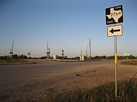 View northeast at junction of US 90 Alt. and FM 2764