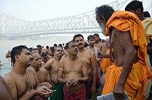 Tarpan is being done at the Jagannath Ghat, Kolkata.