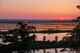 A sunset view of Hachirōgata, from Mikurabana Park