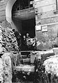 Pavement slabs barricade and a trench behind it during the Warsaw Uprising