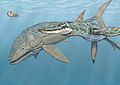 ’n Pliosaurus (regs) en ’n Leedsichthys in die see.