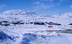 Part of the village with characteristic Kinngait hill, May 1997