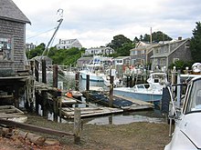 Fishing cottages and boats on Menemsha's harbor