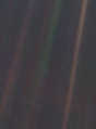 Image 10 Pale Blue Dot Photo credit: NASA/JPL Pale Blue Dot is the name given to this 1990 photo of Earth taken from Voyager 1 when its vantage point reached the edge of the Solar System, a distance of roughly 3.7 billion miles (6 billion kilometres). Earth can be seen as a blueish-white speck approximately halfway down the brown band to the right. The light band over Earth is an artifact of sunlight scattering in the camera's lens, resulting from the small angle between Earth and the Sun. Carl Sagan came up with the idea of turning the spacecraft around to take a composite image of the Solar System. Six years later, he reflected, "All of human history has happened on that tiny pixel, which is our only home." More selected pictures