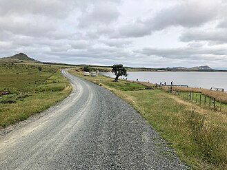 Te Whanga Lagoon at Blind Jims Creek. 178m Korako is to the left, 149m Rangitihi and 188m Mt Chudleigh to the right.