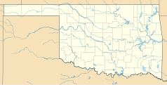 Mapa konturowa Oklahomy, u góry nieco na prawo znajduje się punkt z opisem „Lucien”