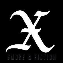 A white, ornate "X" on a black background with a subtle black outline of the album name at the bottom