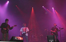 New Order tampil di Festival Southside di Neuhausen ob Eck, Jerman pada 2005