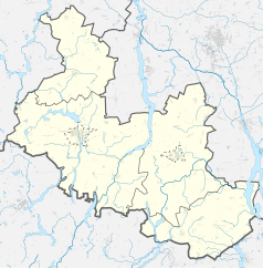 Mapa konturowa powiatu mogileńskiego, blisko centrum na lewo znajduje się punkt z opisem „Mogilno”