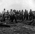 Putting dead body on fire, Galveston, Texas