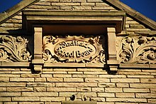 Sheffield School Board sign on the old Anns Grove School, Heeley, (now Sum Studios)