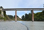 photo of a bridge high above over a river