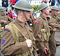 En 1938 o exército británico adoptou no seu uniforme de campaña a chaqueta curta.