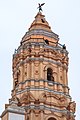 Torre principal, campanario y el ángel sobre la cima.