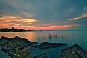 Long exposure photo of a sunrise by the lake