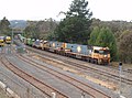 Pacific National freight train passing through Belair