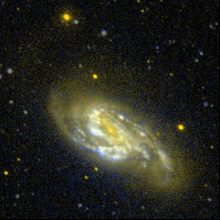 Una imagen en ultravioleta de Messier 66 sacada por GALEX