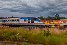 Gray trainset power car with blue swish