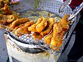 Fritter peddler offering pisang goreng, Indonesian banana fritter