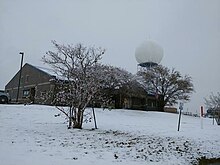 Snowfall on the ground outside an office of the National Weather Service on December 8.