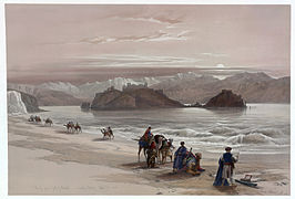 Une caravane de commerce passant l'île de Graia dans le golfe d'Aqaba, en Arabie pétrée, lithographie de Louis Haghe d'après un original de David Roberts, 1839.