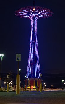 Purple lights on the Parachute Jump at night