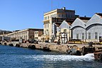 Early 20th-century machine shop (left) and boat sheds (right) alongside No. 7 dock and the adjacent wharf.