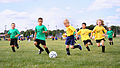 Children playing soccer