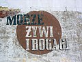 Mural będący nośnikiem treści społecznych (mural propagandowy) z portu morskiego w Helu