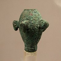 Bronze mace head with 4 ram heads, Siba Culture, 1900-1400 BC. Probably derived from the Seima-Turbino culture.[8]