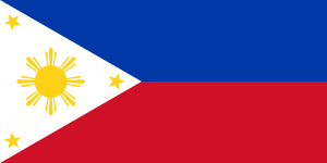 Flag of the Philippines (1898). The yellow sun is in the middle of the triangle shape.